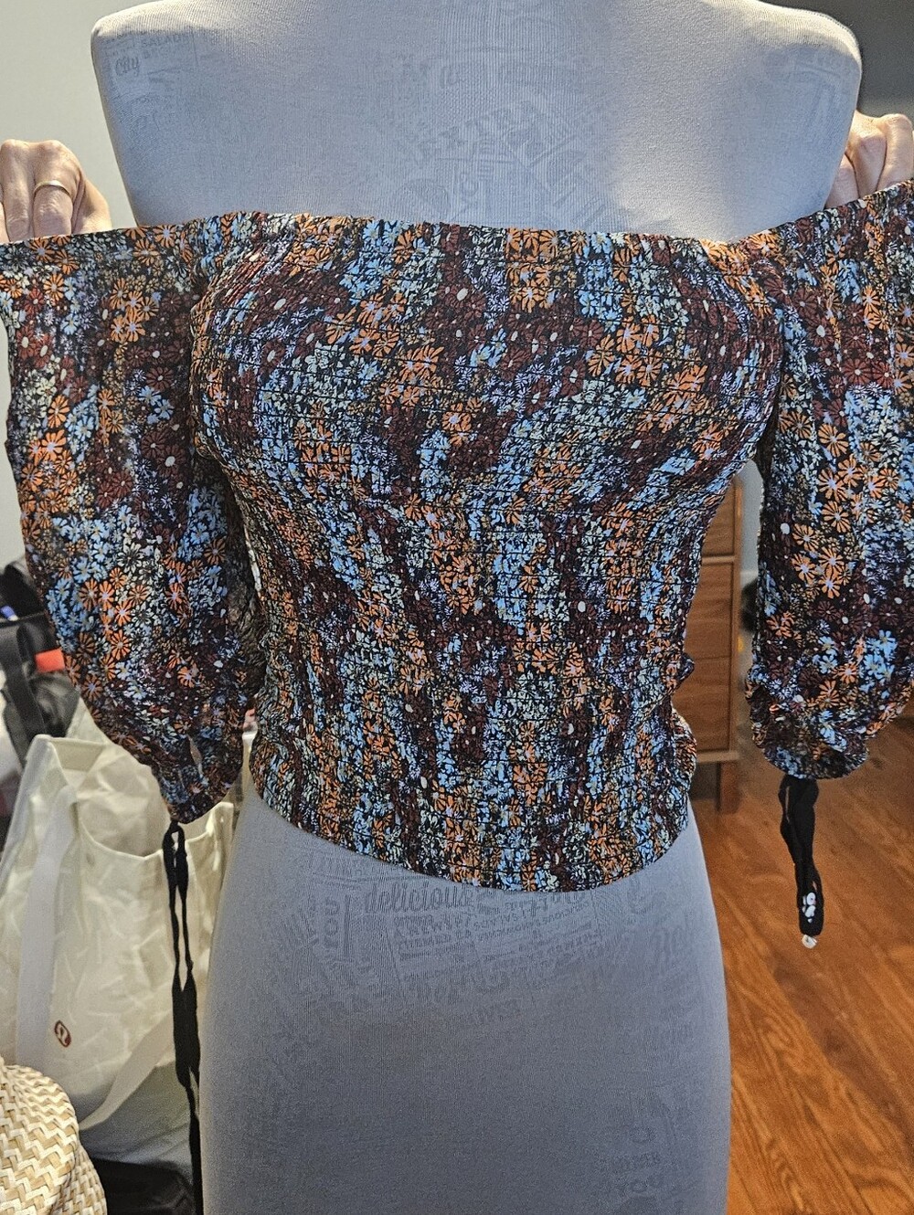 Free People Floral Smocked Off-Shoulder Crop Top in Brown and Light Blue